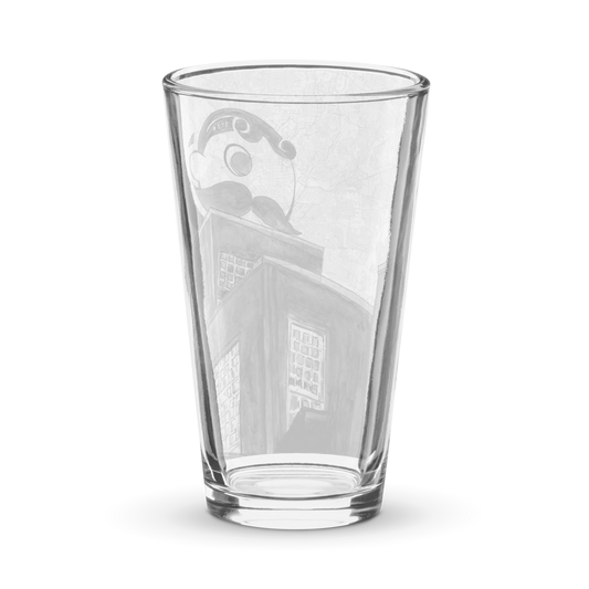 A picture of the back side a clear pint glass with a printed image of a watercolor painting of Baltimore's Natty Boh tower on a map of the city