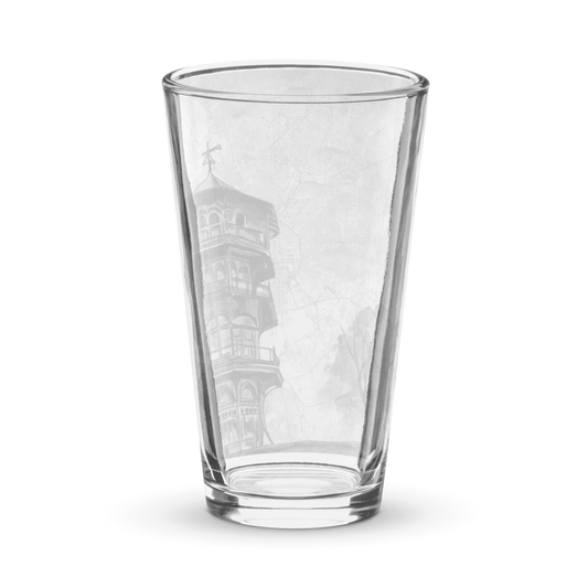 back view pint glass with printed image of a painting of the Patterson Park Pagoda on a map of Baltimore