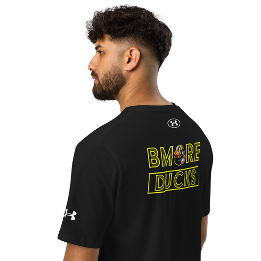 Man wearing a black Under Armour t-shirt with 'BMORE DUCKS' text on the back.