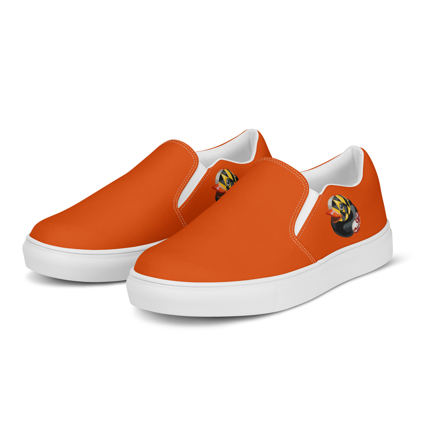 Front angled view of orange BMORE DUCKS! womens slip on canvas shoes