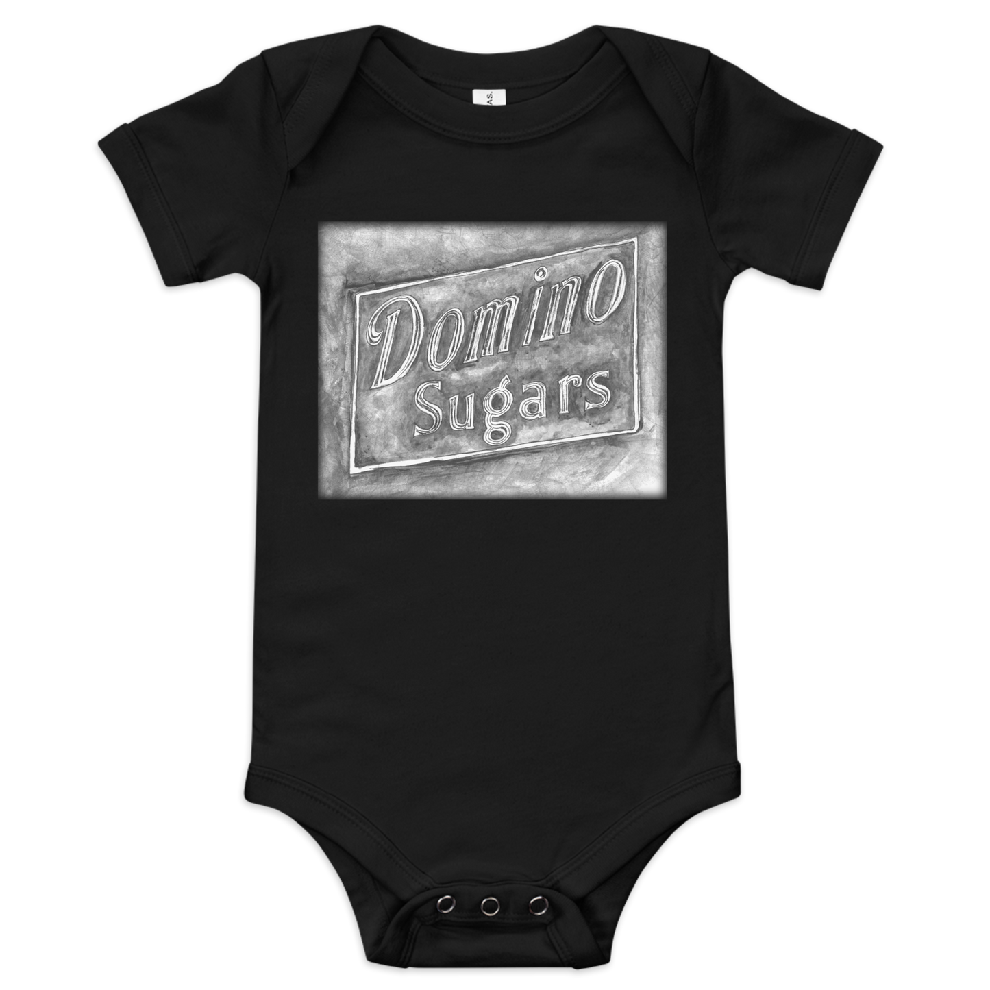 Picture of a black baby onesie with a printed image of a watercolor painting of the Domino Sugars sign painted on a map of Baltimore