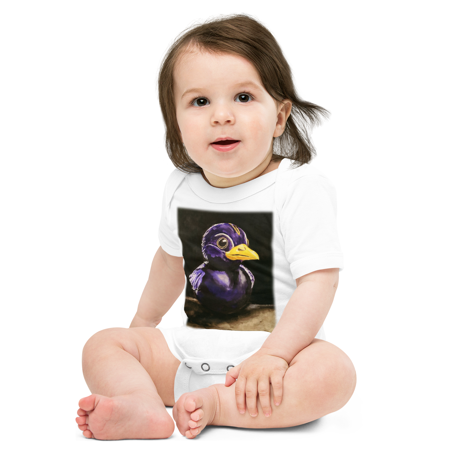 baby wearing a baby onesie in white with image of painting of a rubber duck in black and purple