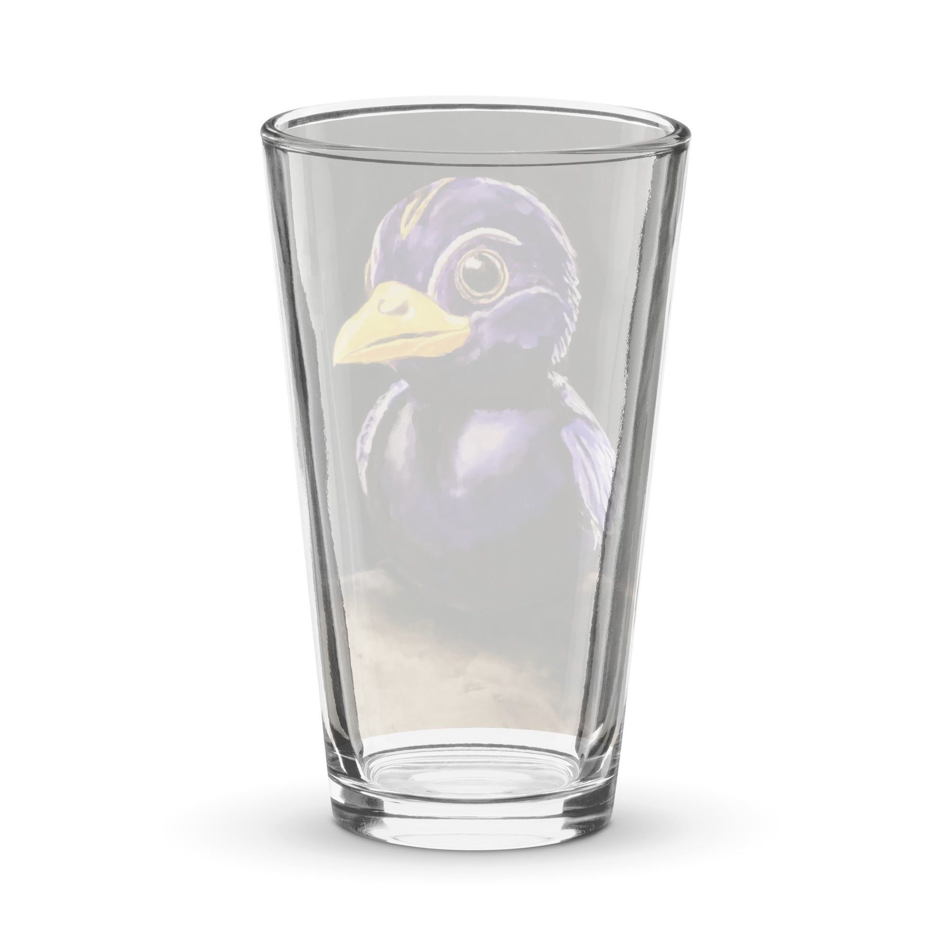 Back view of a pint glass with a print of a painting of a rubber duck in black and purple