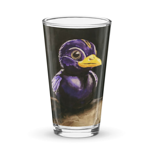 Pint glass with a print of a painting of a rubber duck in black and purple