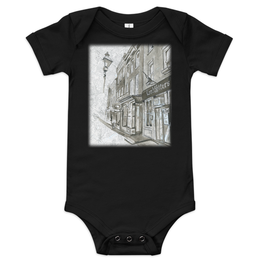 Picture of the front of a black baby onesie with a printed image of a watercolor painting of Baltimore's Leadbetters painted on a map of the city