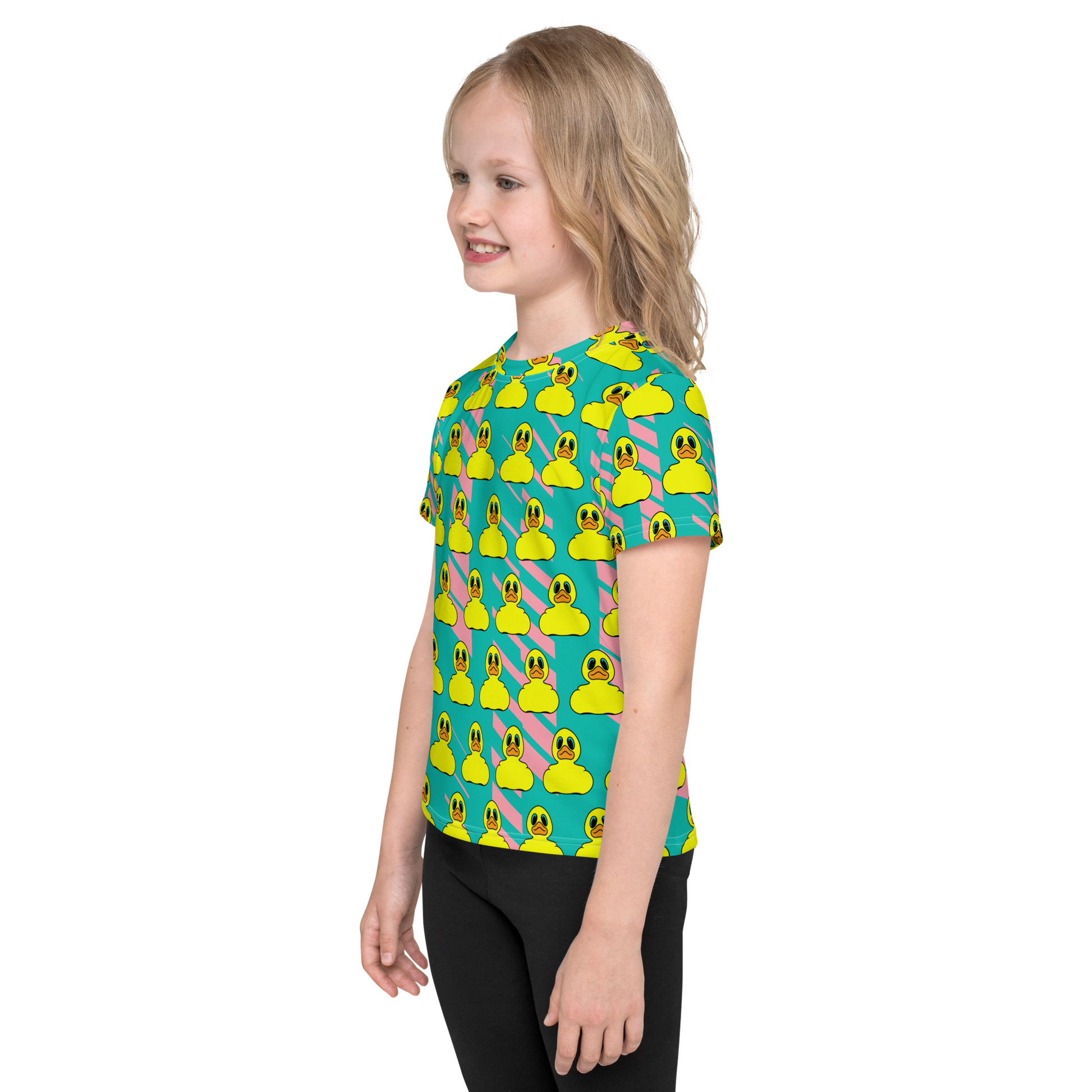 side view of blond girl wearing all over print t shirt with Classic yellow BMORE DUCKS! rubber duck pattern