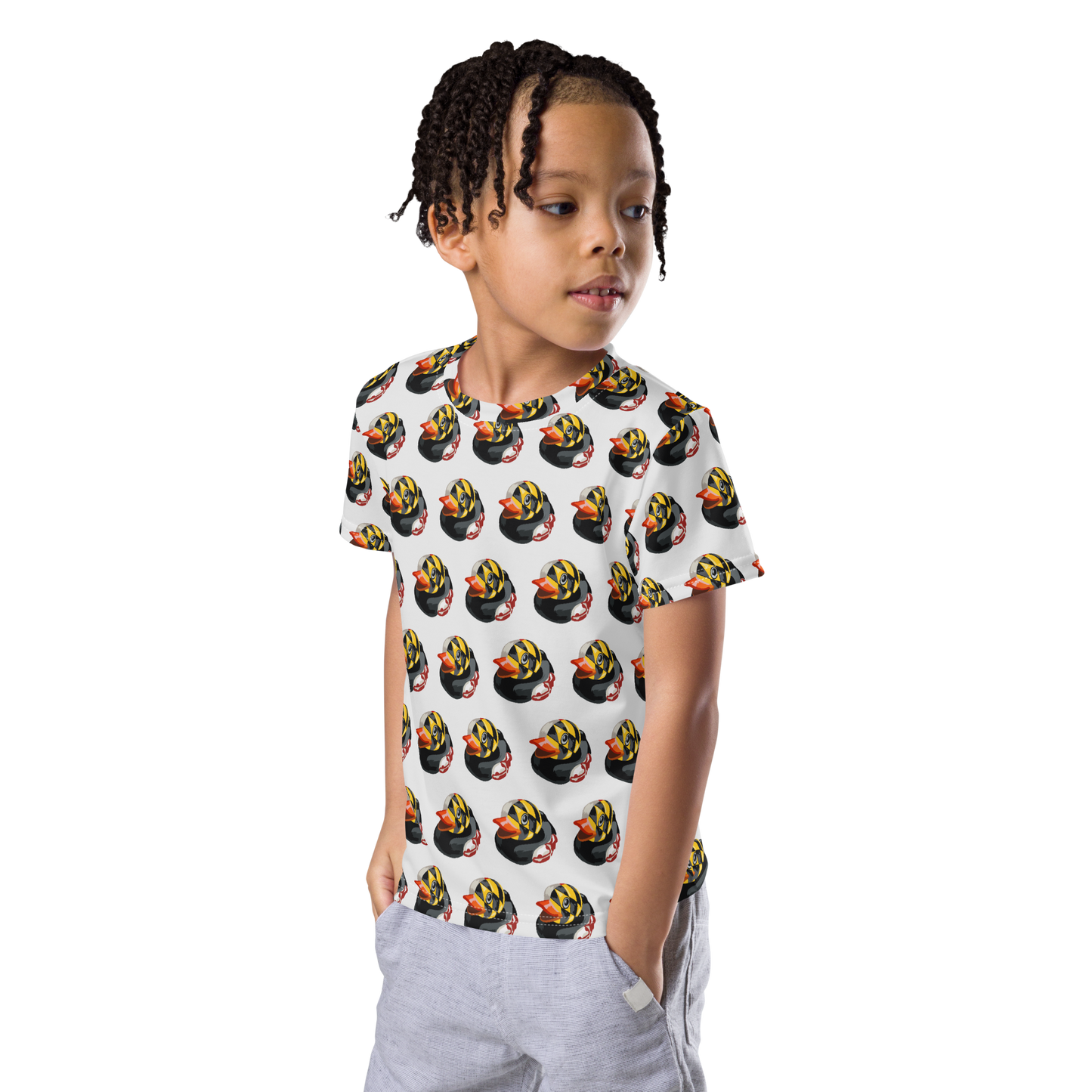 side view of child wearing all over print t-shirt with pattern of Maryland BMORE DUCKS! logo