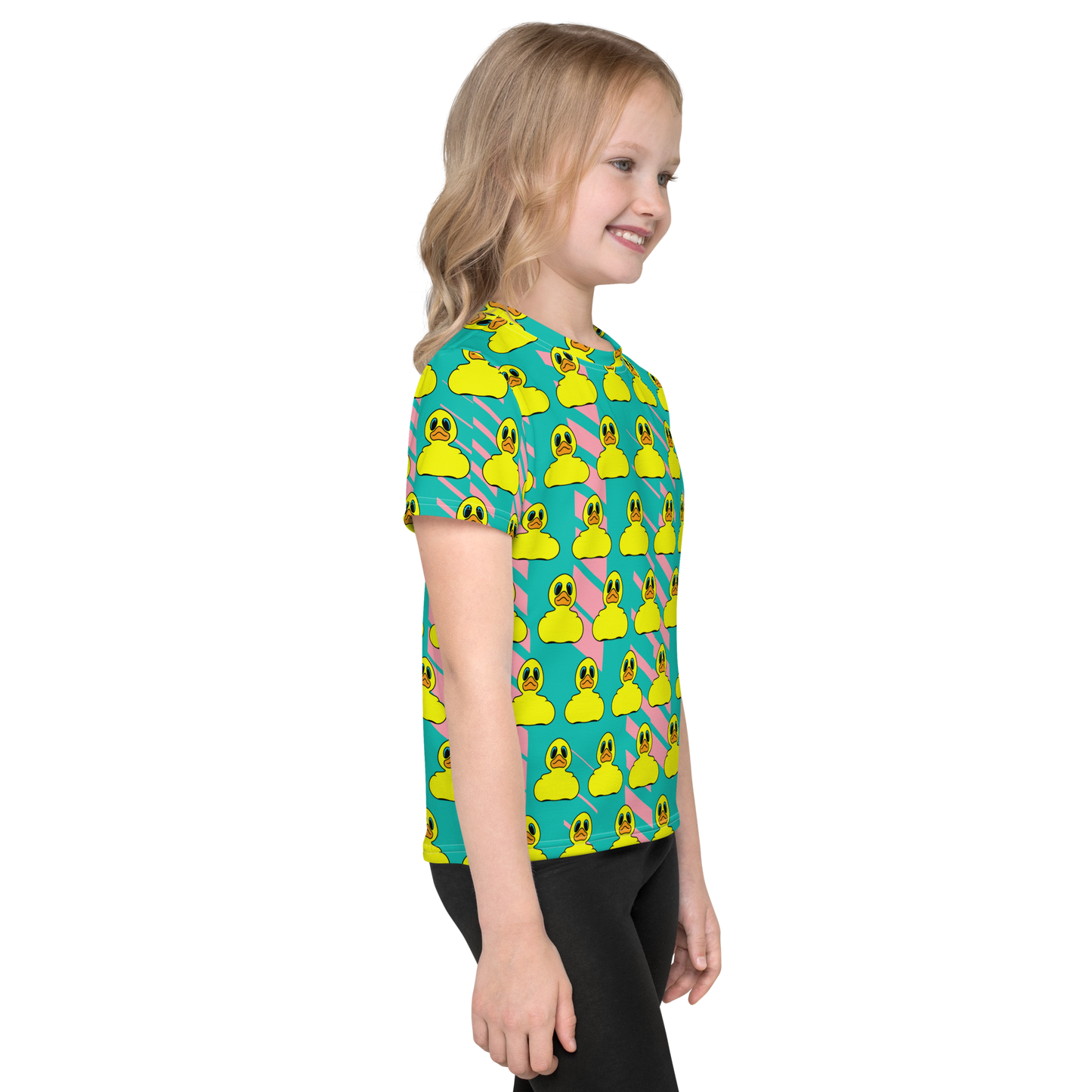 side view of blond girl wearing all over print t shirt with Classic yellow BMORE DUCKS! rubber duck pattern