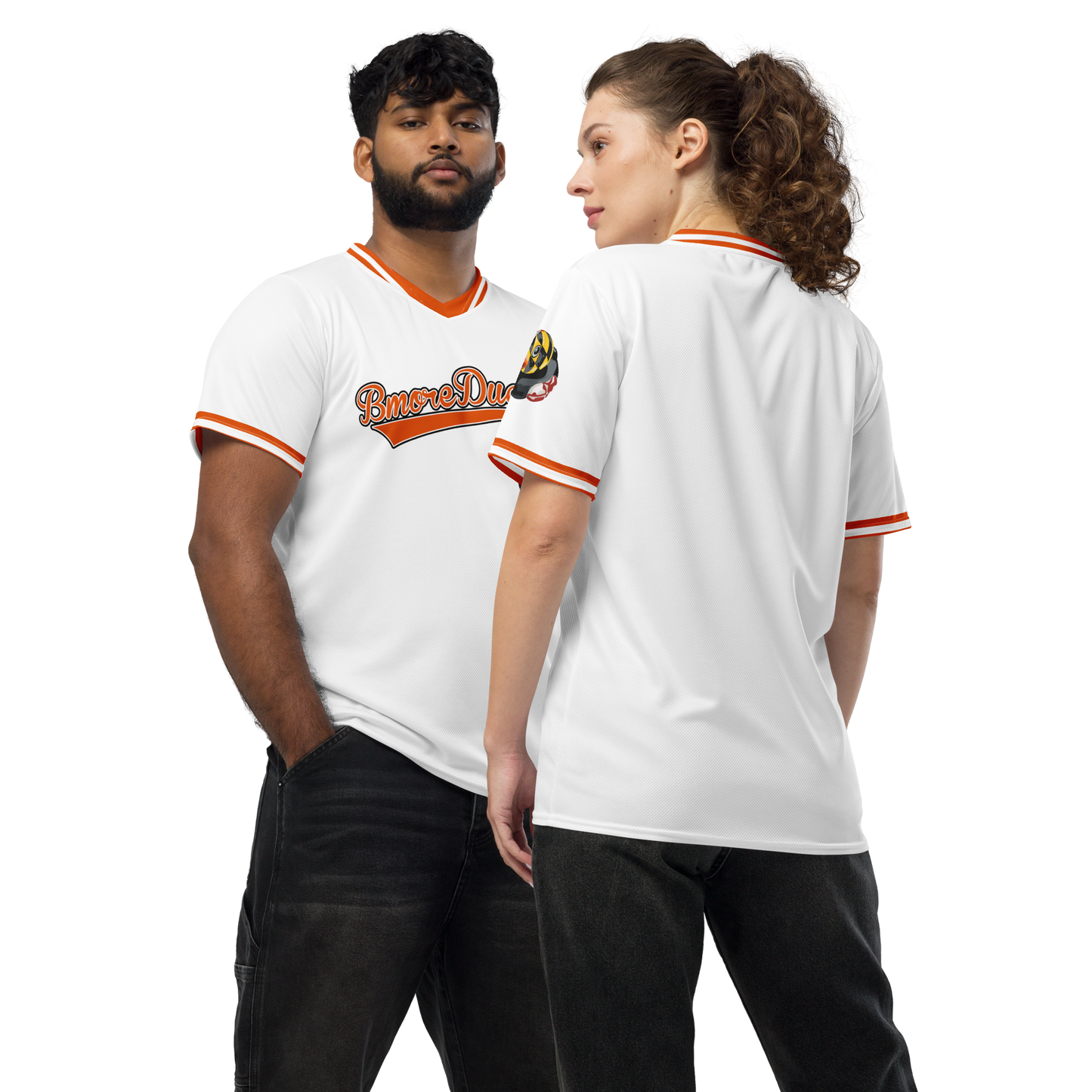 couple modeling an white baseball style jersey with BMORE DUCKS! in script and rubber duck with Maryland flag overlay logo