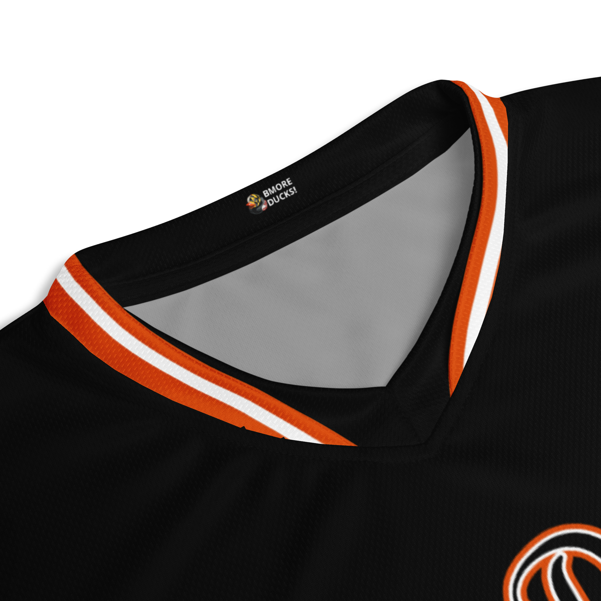 view of orange and white striped v-neck collar on black jersey