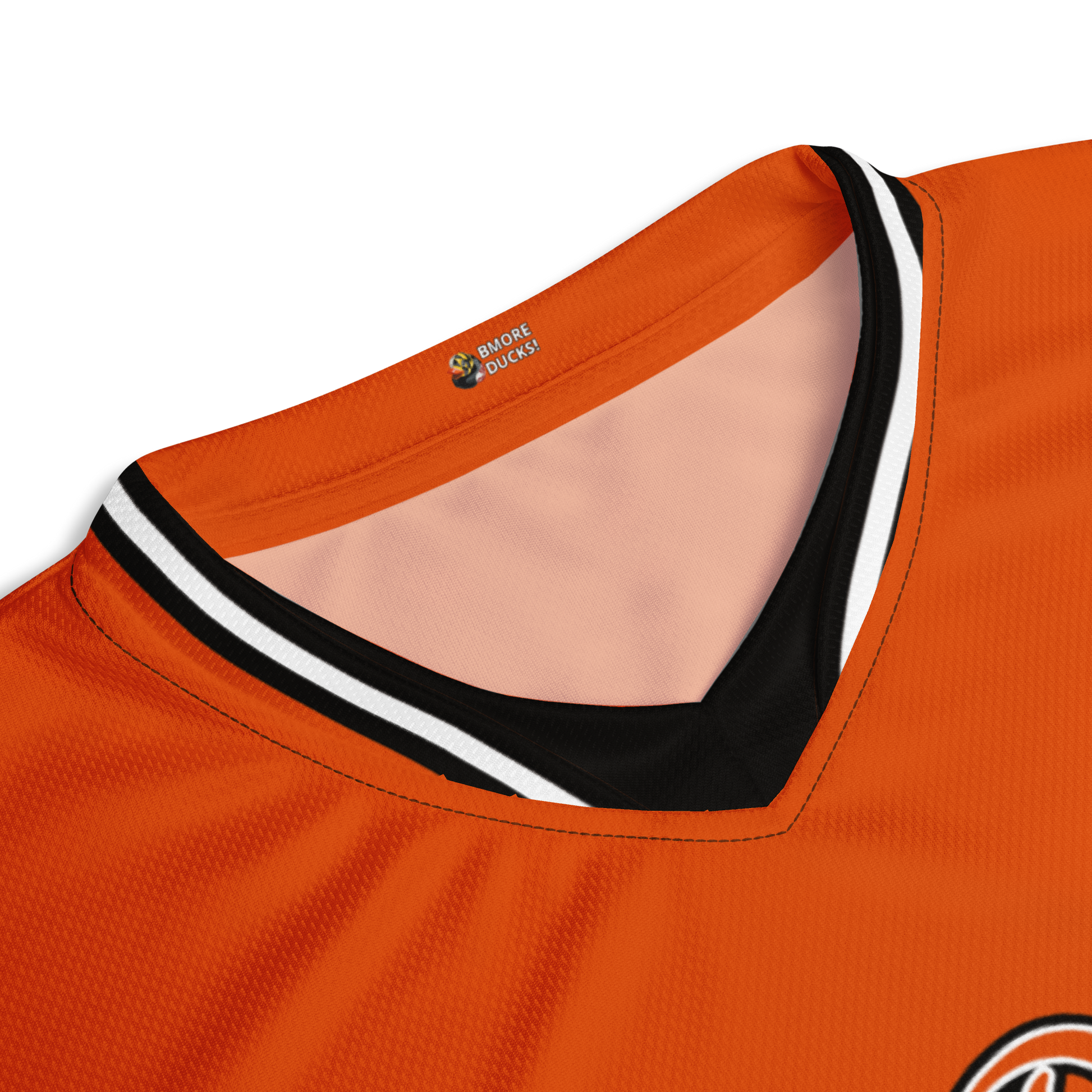 collar of orange jersey with black and white striped collar