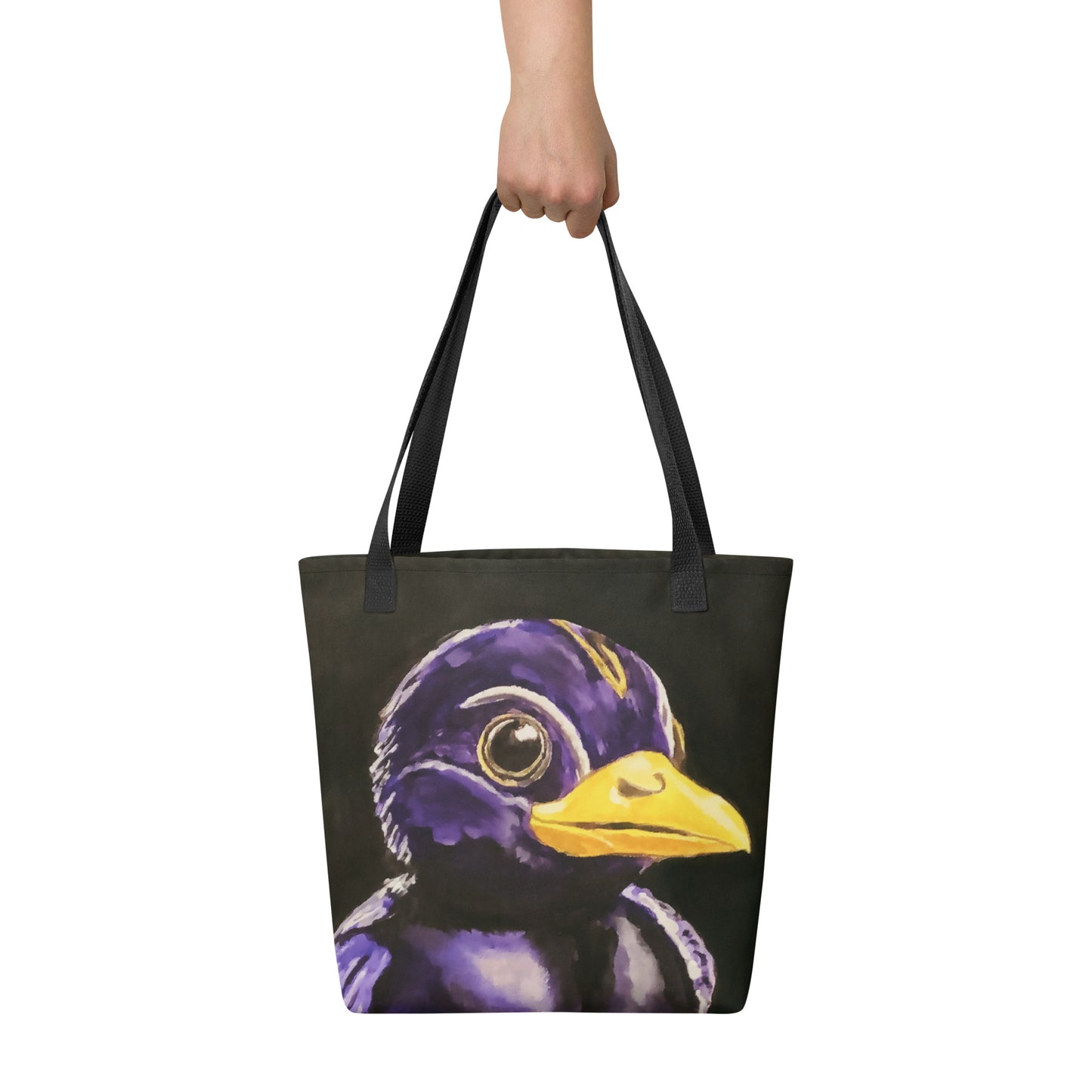 black tote bag with painting of a baby black and pruple bird