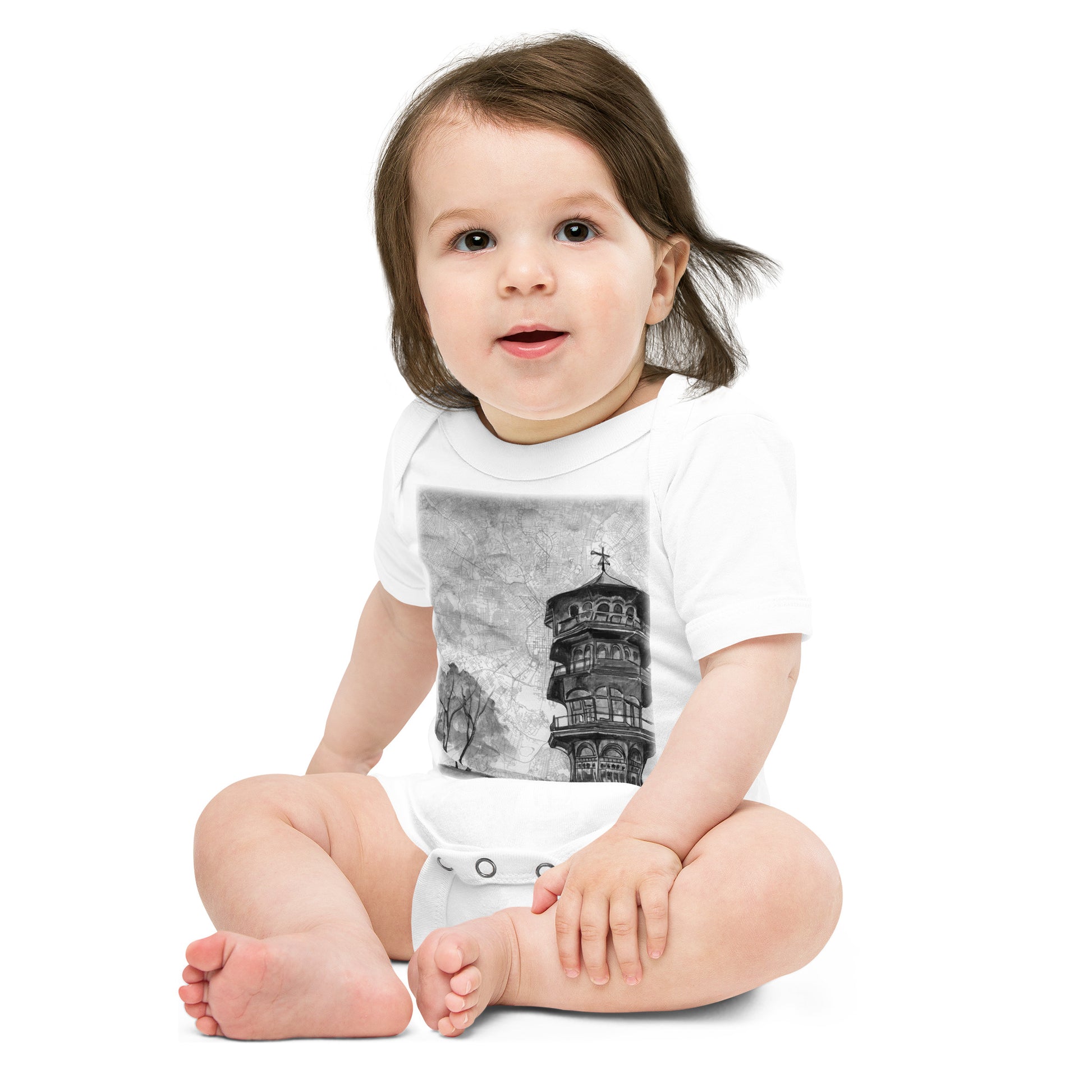 baby wearing a Baby onesie in white with printed image of a painting of the Patterson Park Pagoda on a map of Baltimore