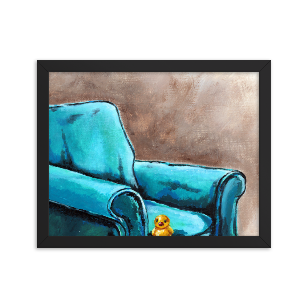 11x14 Framed print of a painting of a rubber duck sitting in a blue arm chair. Framed in black