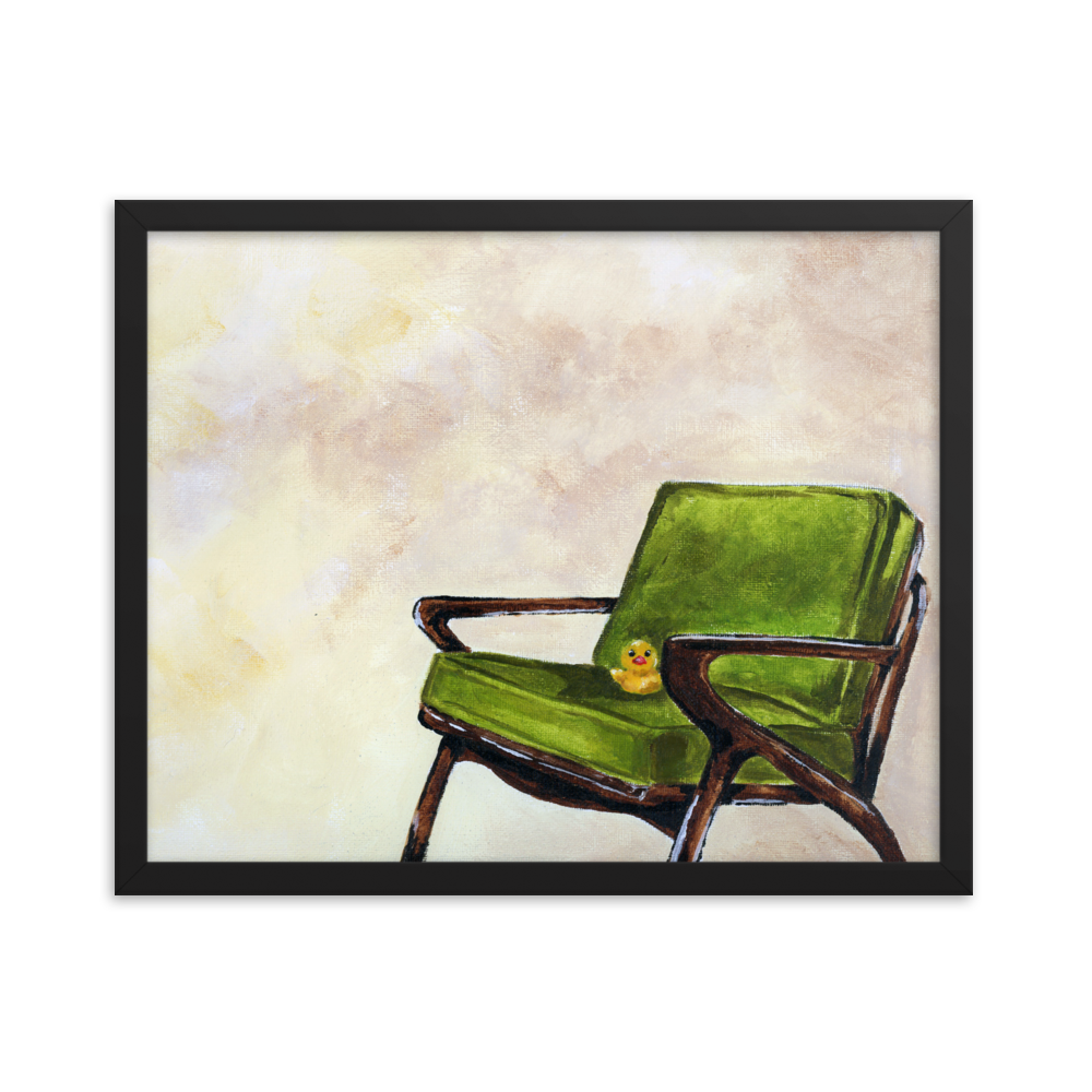 16x20 Framed print of a rubber duck sitting in a green mid century arm chair. Framed in black