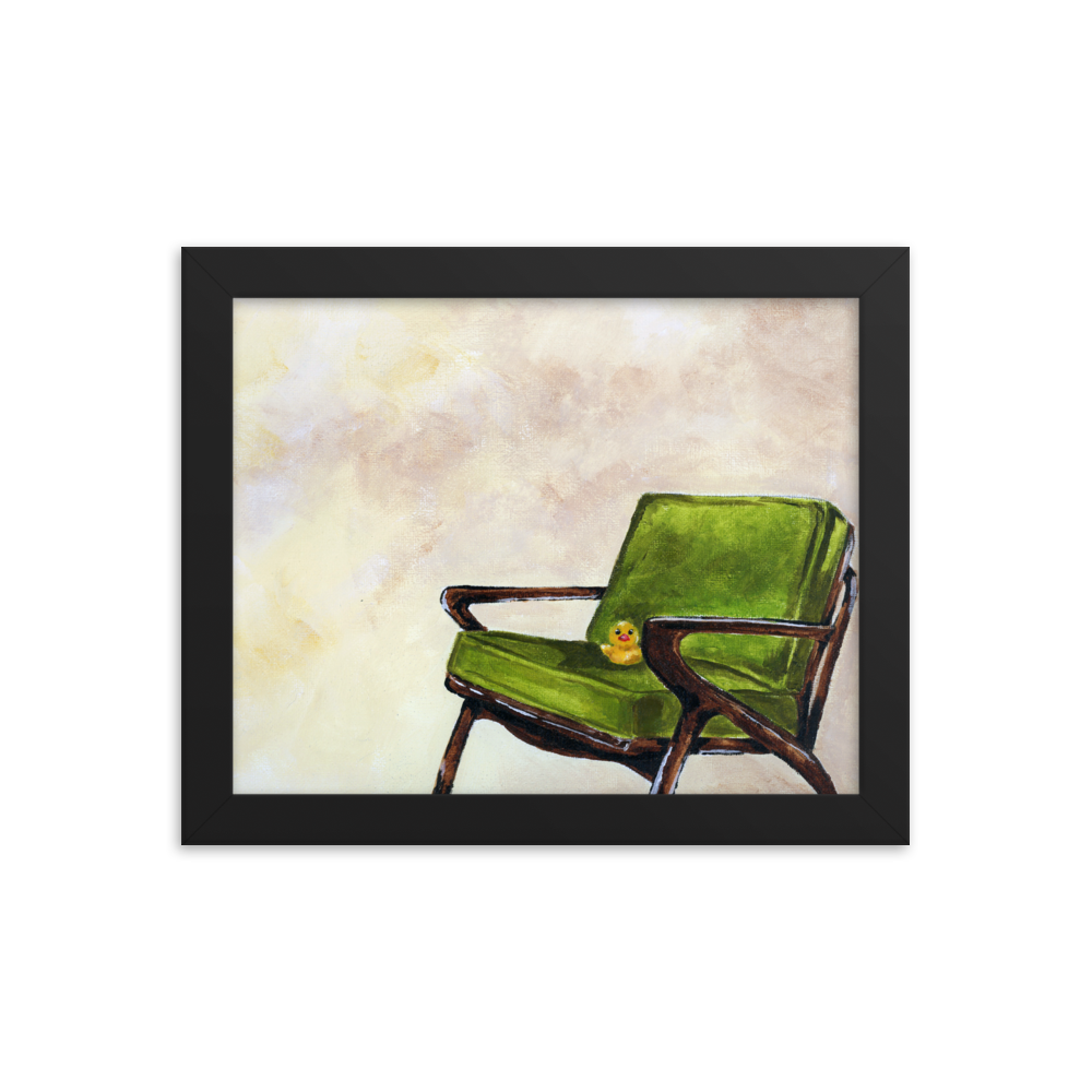 8x10 Framed print of a rubber duck sitting in a green mid century arm chair. Framed in black