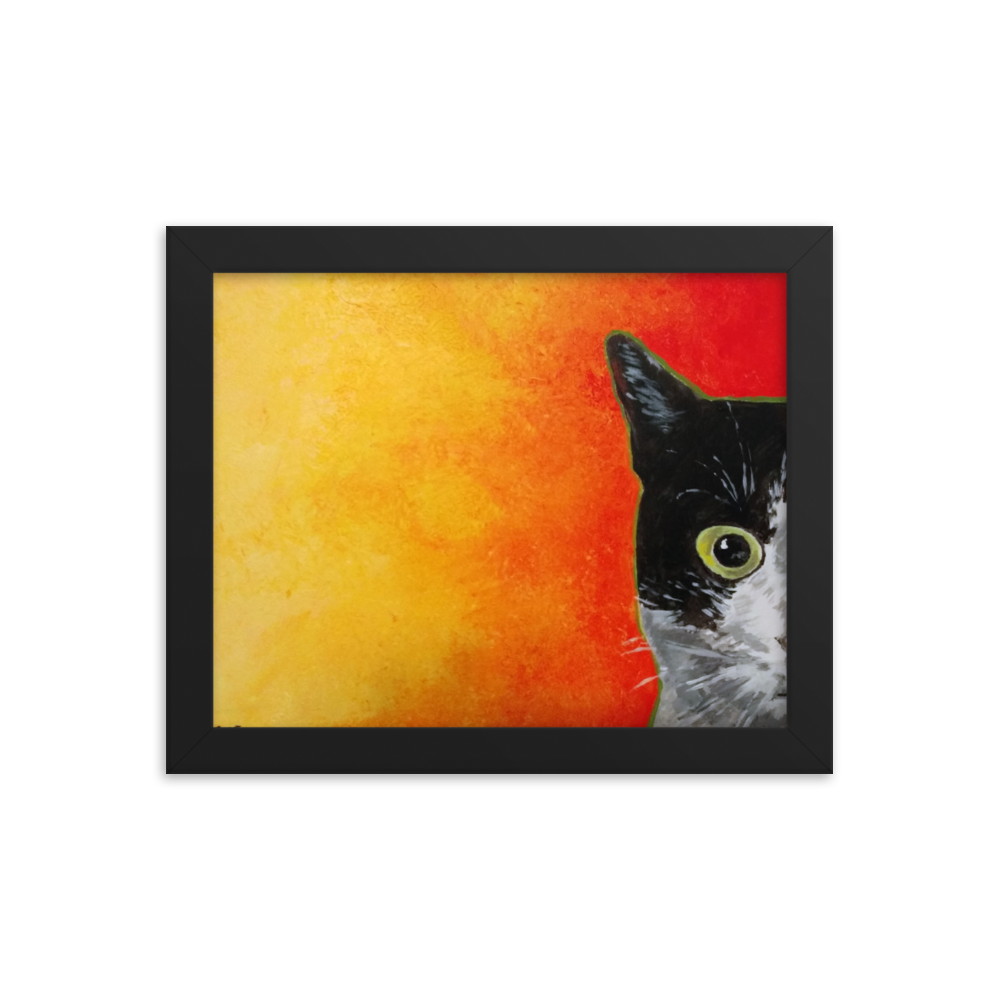 8x10 Framed print of a black and white cat with green eyes and a yellow to red faded background. Framed in black