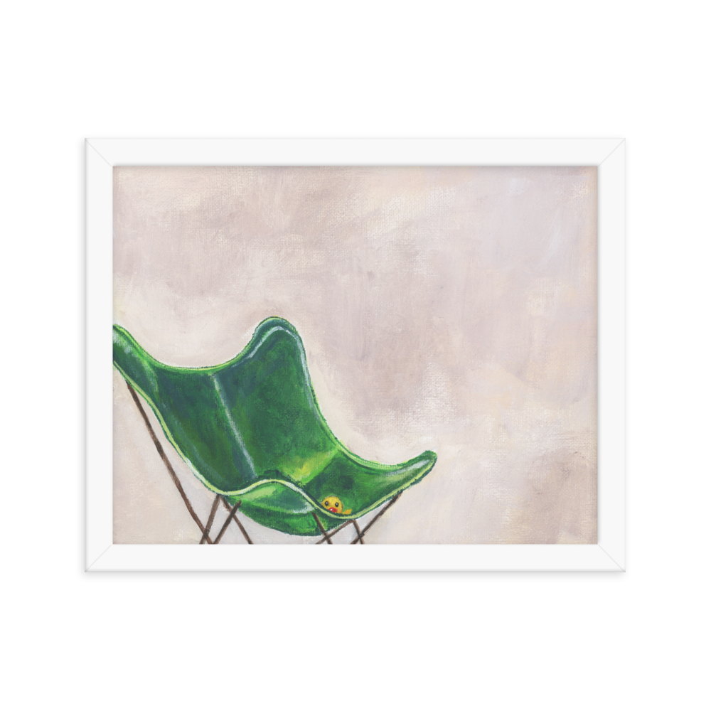 11x14 Framed print of a rubber duck sitting in a green butterfly chair. framed in white