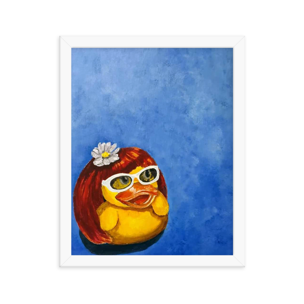 11x14 Framed print of a rubber duck wearing a wig with a white flower on top and white glasses. Framed in white