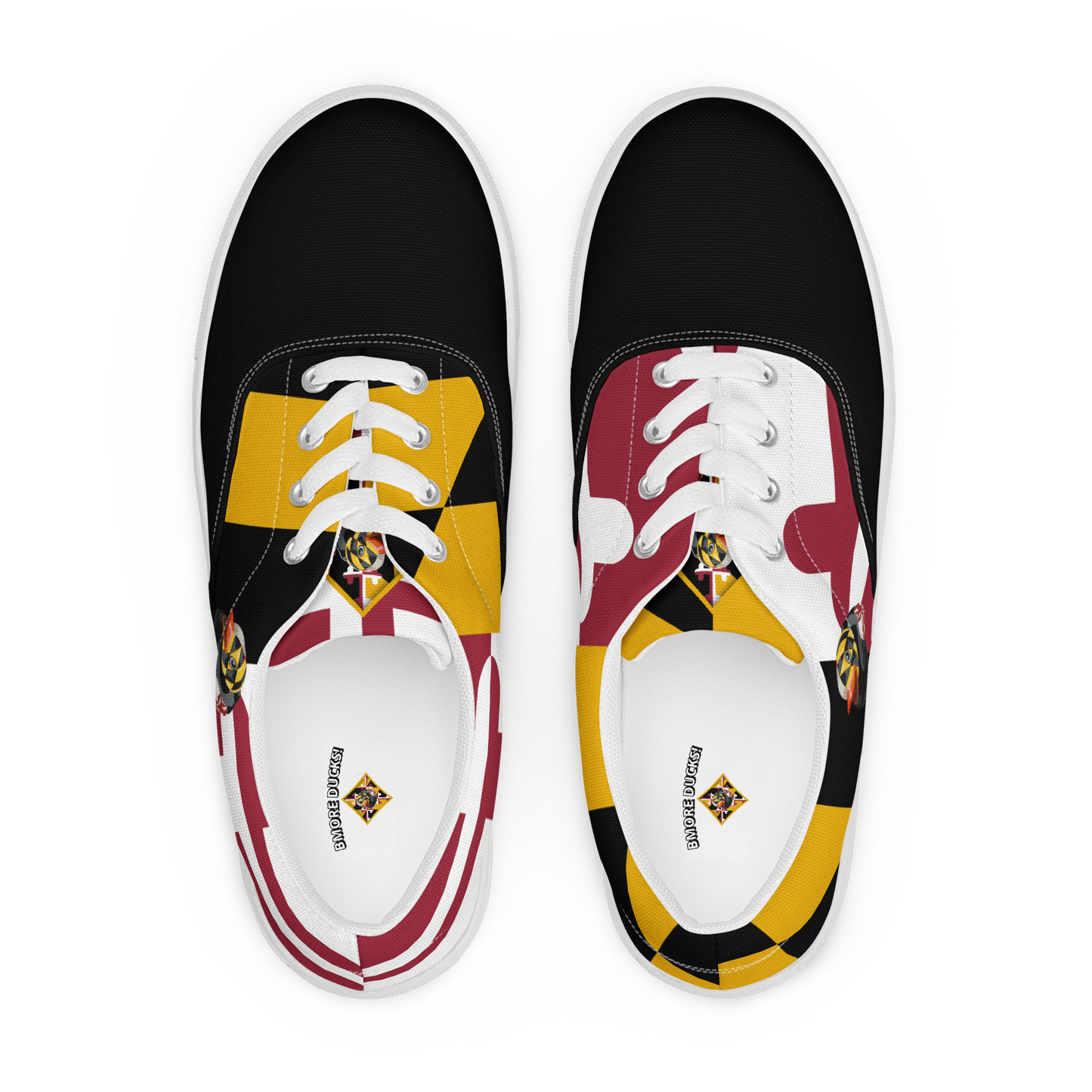 overhead view of men's lace up canvas shoes with Maryland flag pattern, BMORE DUCKS! logo, white soles, and black toes