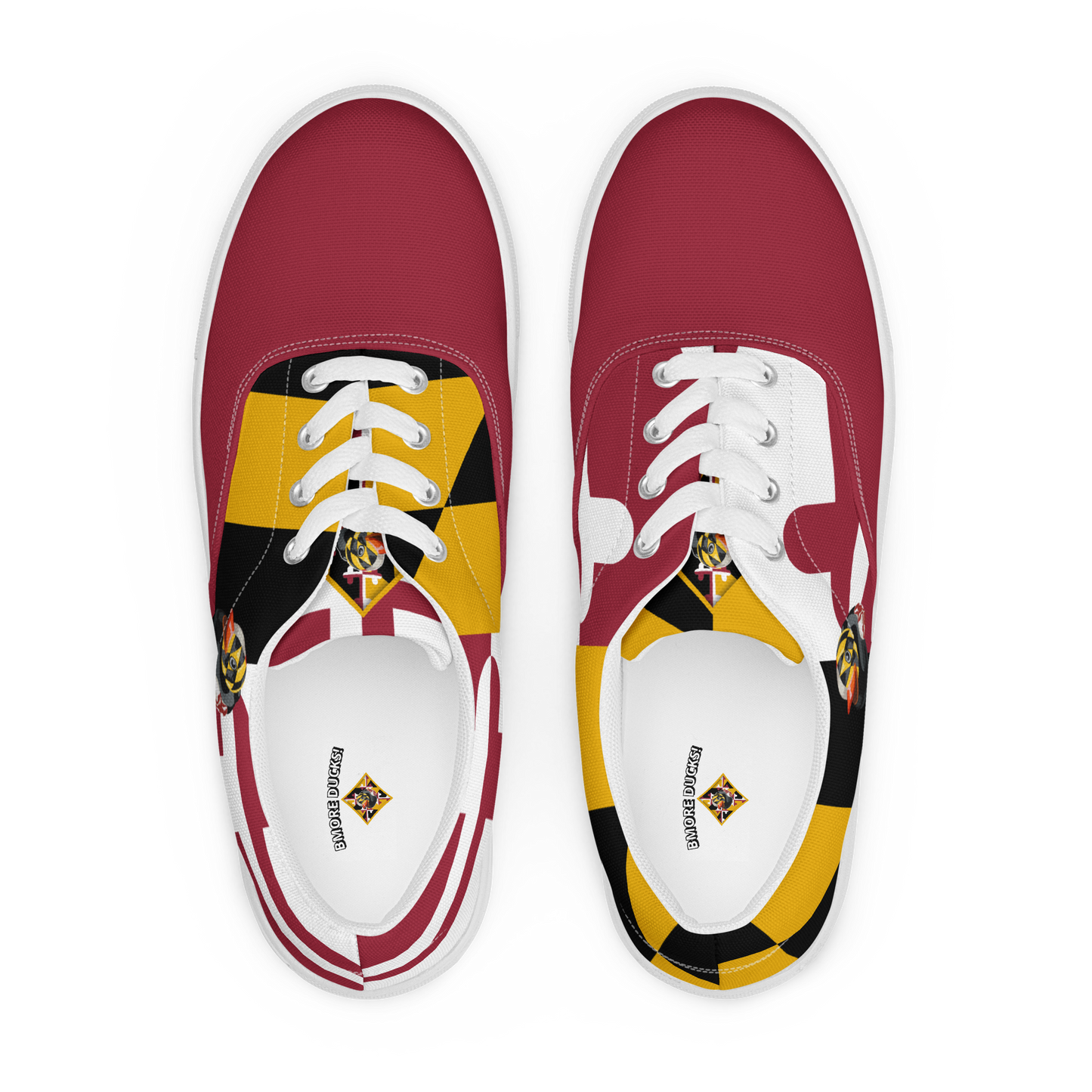 overhead view of men's lace up canvas shoes with Maryland flag pattern, BMORE DUCKS! logo, white soles, and red toes