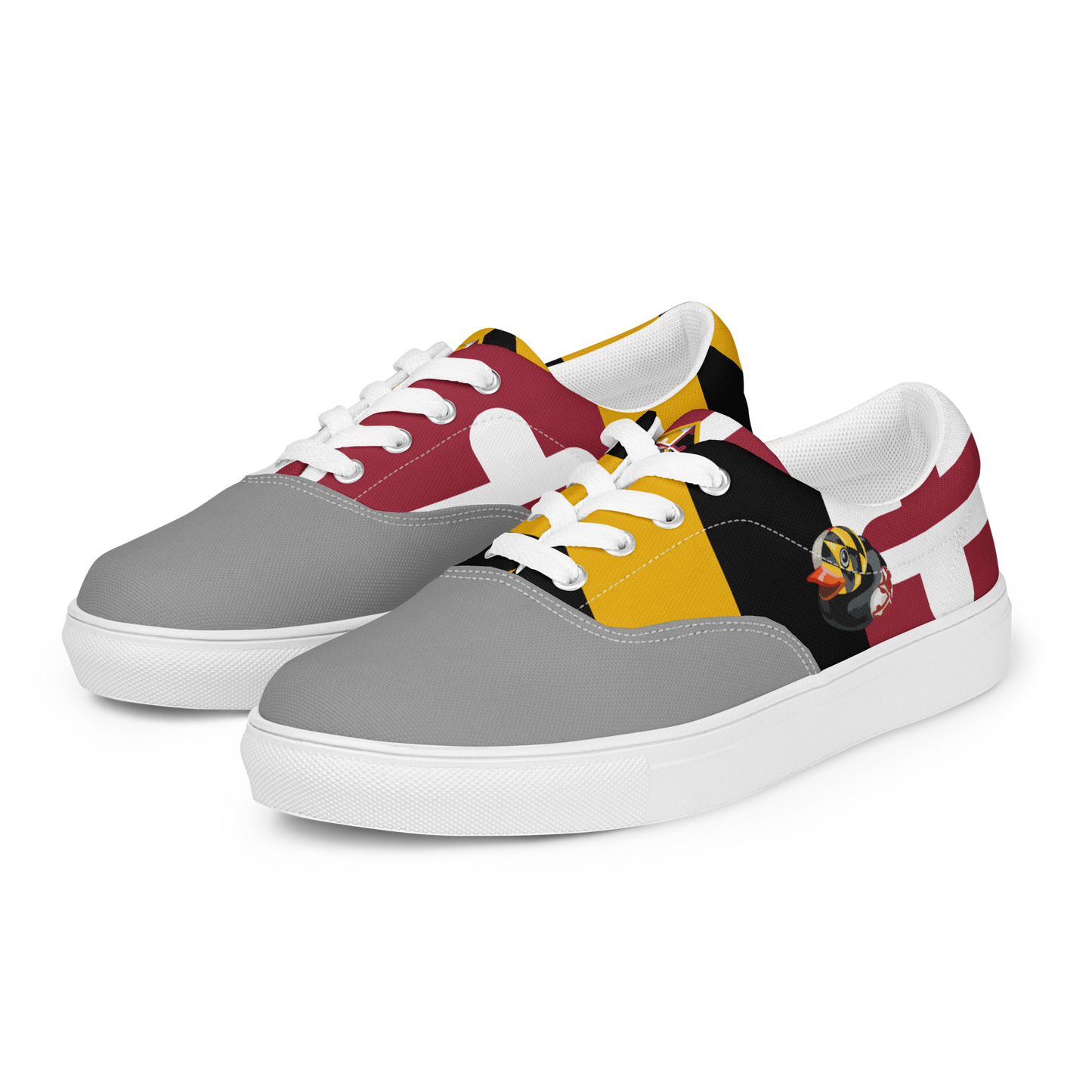 front side view of men's lace up canvas shoes with Maryland flag pattern, BMORE DUCKS! logo, white soles, and gray toes