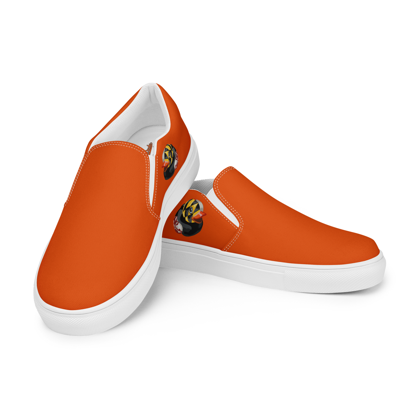 Front angled view of pair of orange BMORE DUCKS! mens canvas slip on shoes