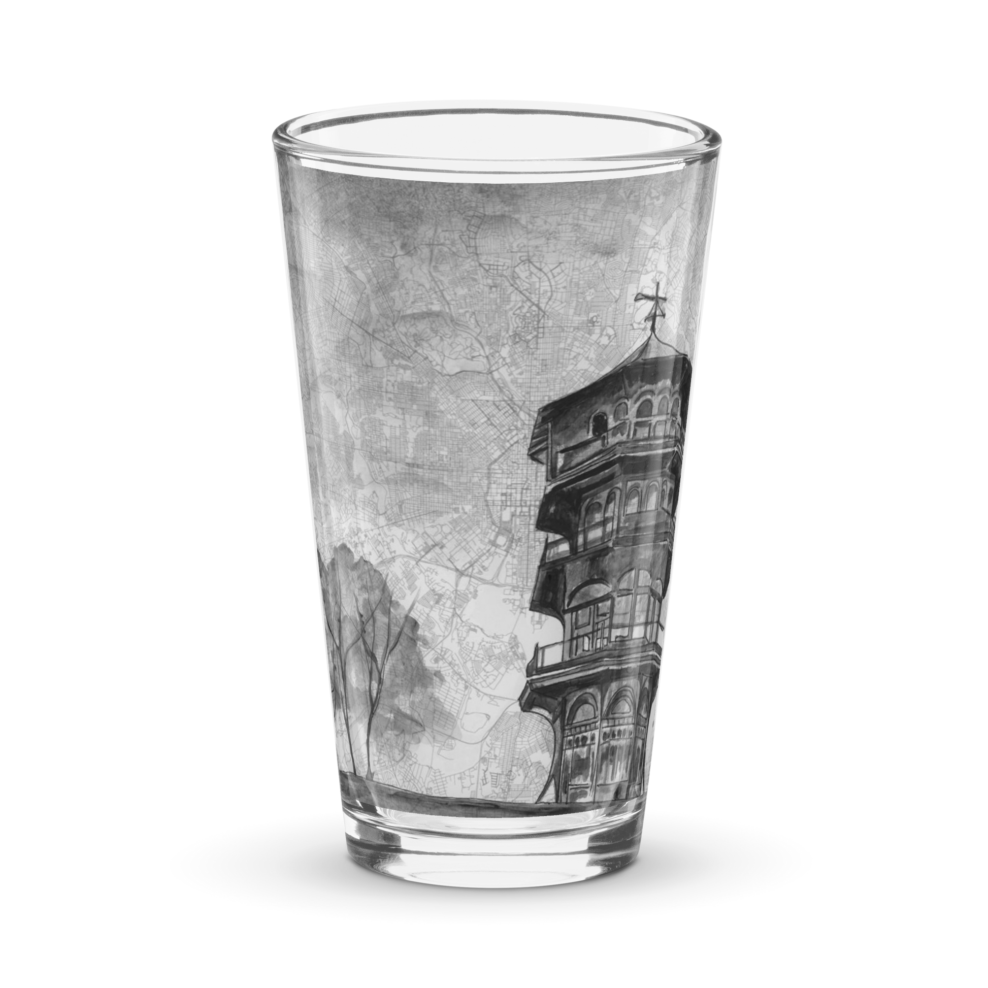 pint glass with printed image of a painting of the Patterson Park Pagoda on a map of Baltimore