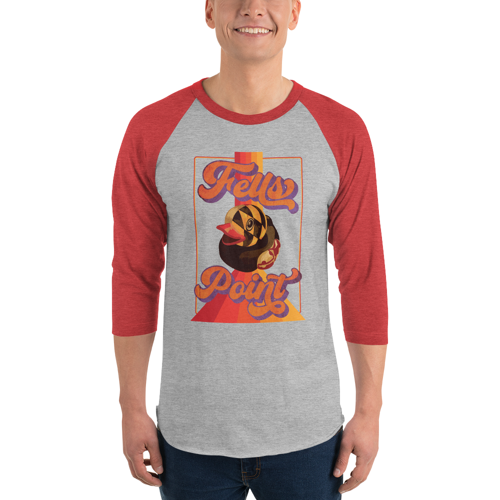 man wearing a red sleeve, gray centered raglan shirt with a vintage 1970's design that says "Fells Point" and  features a Maryland flag rubber duck