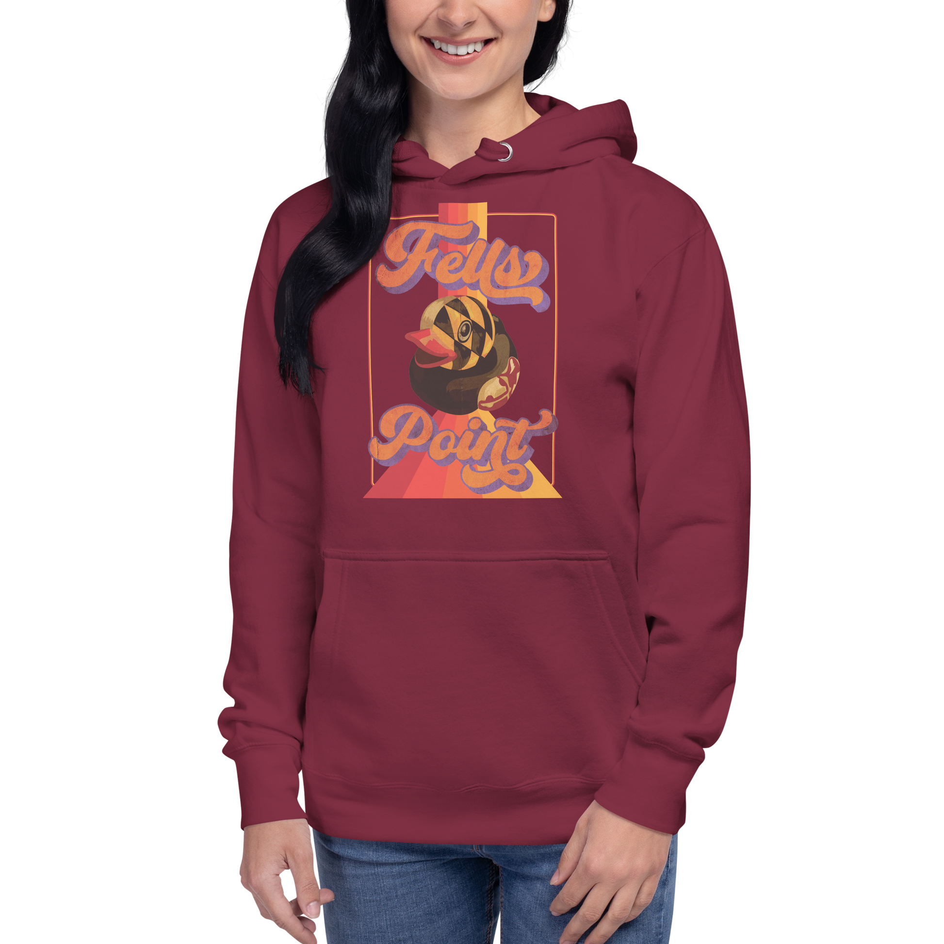 woman wearing a maroon pullover hoodie with fells point maryland rubber duck vintage design on chest