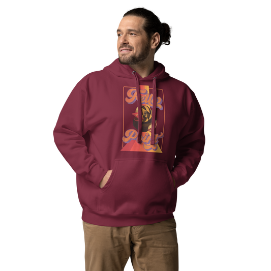 man wearing a maroon pullover hoodie with fells point maryland rubber duck vintage design on chest