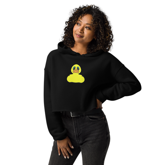 woman wearing a black cropped hoodie with yellow rubber duck logo on center chest